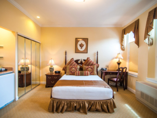 Gothic Garden, queen bed with closet and bedside desk